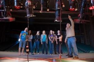 Larry Wheeler speaks to a group of students about the lighting in Van Ellis Theatre.